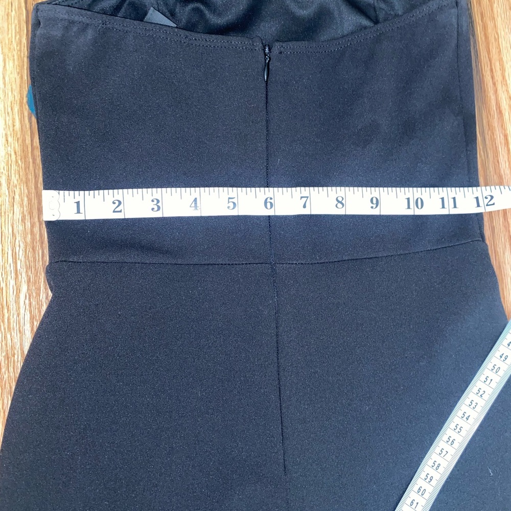 SOLD- Lulus After Midnight Black Ruffle Leg Strapless Jumpsuit - Picture 7 of 12
